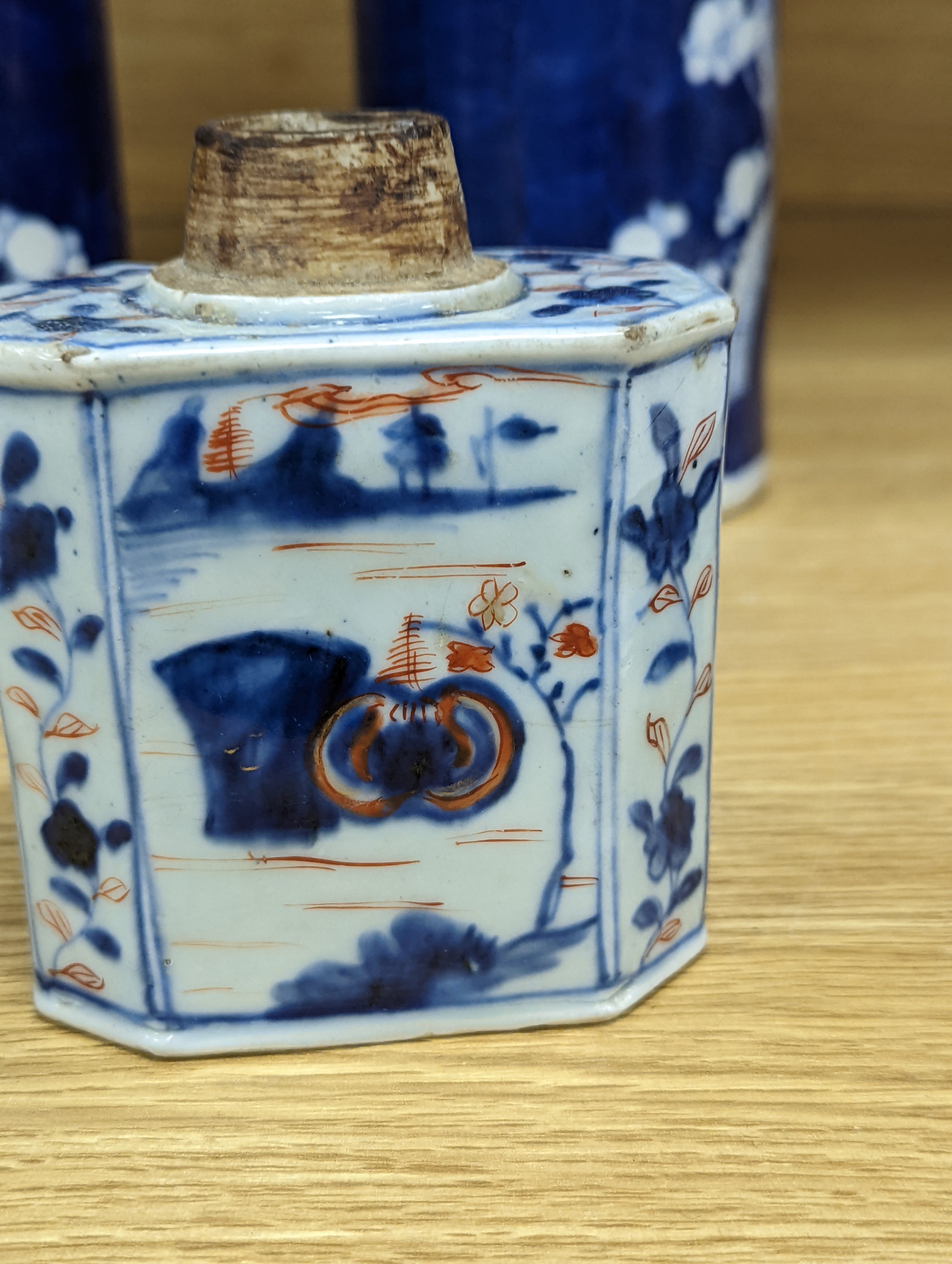An 18th century Chinese famille rose mug, a Chinese Imari tea caddy and two Chinese blue and white sleeve vases 30cm (4)